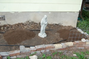 Broccoli Bed with mounds of screened compost prior to smoothing